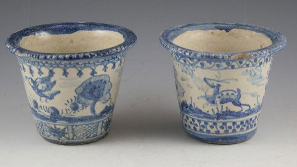 Pair of 18th century blue and white faience m: Pair of 18th century blue and white faience mini planters from Triana quarter of Spain outside Seville. Hand-painted design features animals and birds in a landscape along with upper/lower bands of re