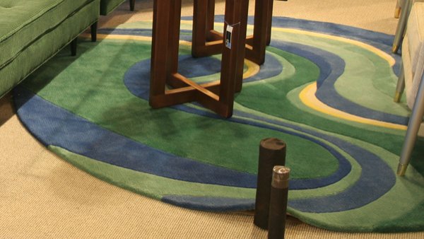 Circular Stark rug 84'diameter with green, bl: Circular Stark rug 84'diameter with green, blue, yellow and cream swirls. DIMENSIONS: 84dia. CONDITION: Good Condition ESTIMATE: $100-$200 uest.