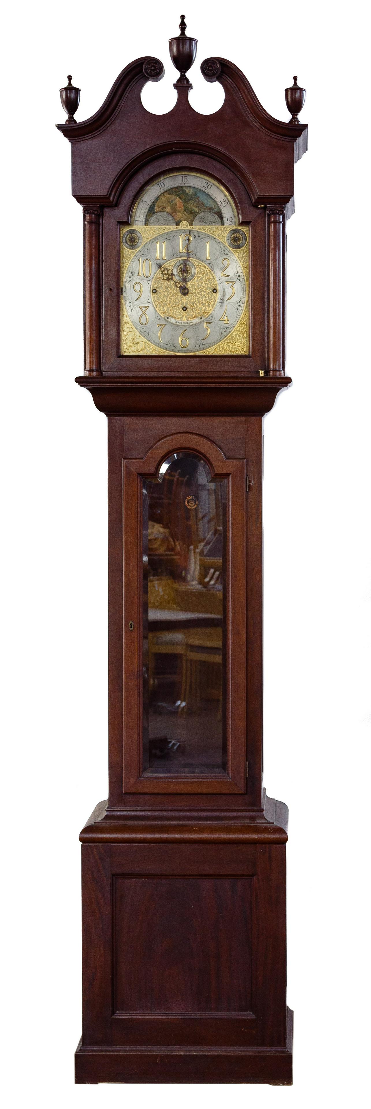 J. J. Elliot of London Tall Case Clock: J. J. Elliot of London Tall Case Clock Dated 1898 on top, distributed by Toby in Chicago, having a moon phase dial and brass scroll work on dial, striking on bells and spiral gongs, (3) weights and a