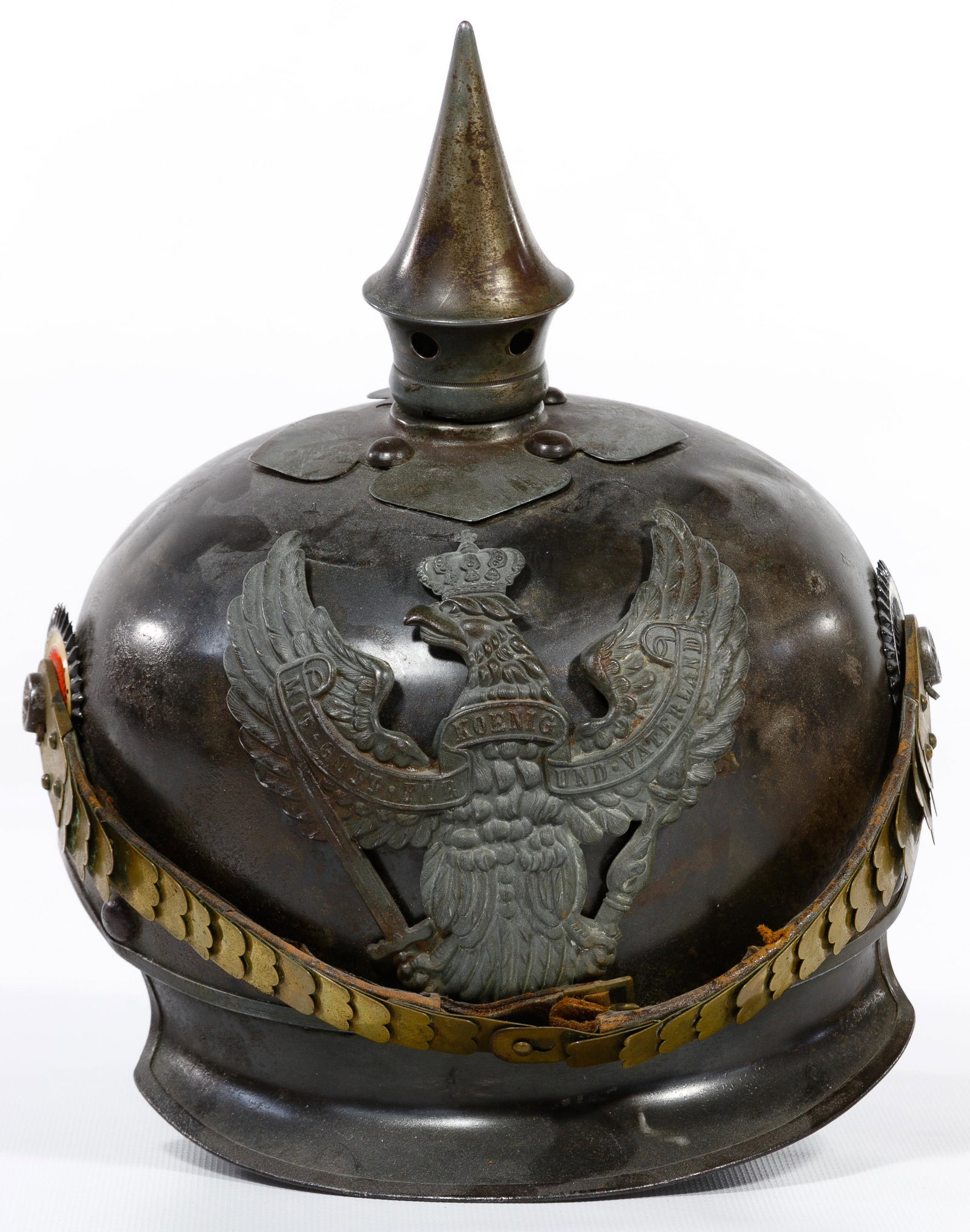 World War I Prussian Jager Regiment Spiked Helmet: World War I Prussian Jager Regiment Spiked Helmet German enlisted man, lobster tail blackened steel helmet having nickel silver trims and spike, brass fish-scale chinstrap, cockades Property from: the