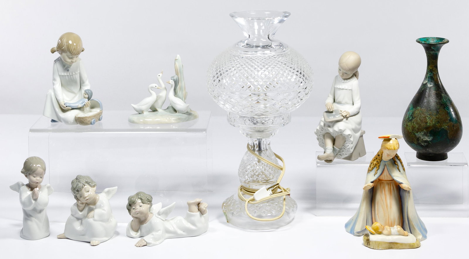 Lladro Figurine and Waterford Crystal Lamp Assortment: Lladro Figurine and Waterford Crystal Lamp Assortment (10) items including glazed #4539 'Angel Thinking' active, #4541 'Angel Reclining' active, #4538 'Angel Praying' active, Nao #564 girl with doll, 