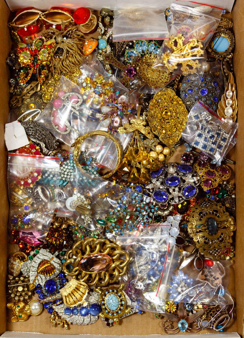 Rhinestone Colorful Jewelry Assortment: Rhinestone Colorful Jewelry Assortment Approximately (6.5) pounds of costume jewelry including brooches, earrings, pins and a bracelet; some pieces signed by Trifari, Kenneth Lane, Ora, Christian Dior