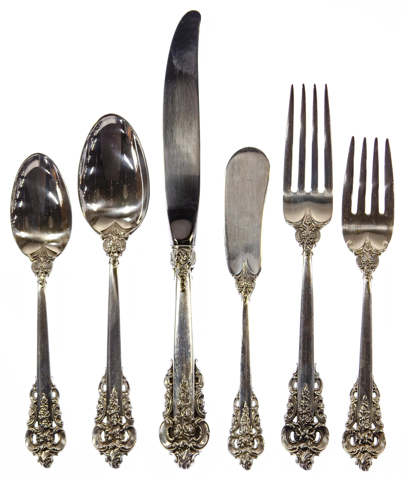 Wallace 'Grand Baroque' Sterling Silver Flatware: Wallace 'Grand Baroque' Sterling Silver Flatware (67) items including (8) dinner knives, (12) butter knives, (8) dinner forks, (8) salad forks, (14) teaspoons, (8) soup spoons and (9) serving utensils