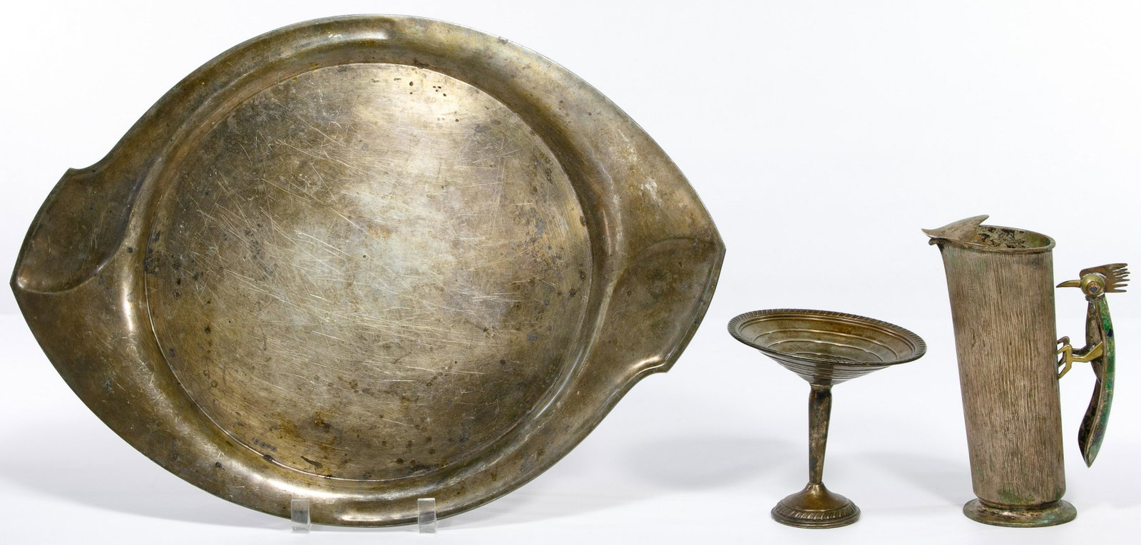 Sterling Silver and Silverplate Assortment: Sterling Silver and Silverplate Assortment (3) items including Mexican silver tray stamped 'sterling' and '925'; weighted compote stamped 'sterling'; and Los Castillo silverplate pitcher having inlaid