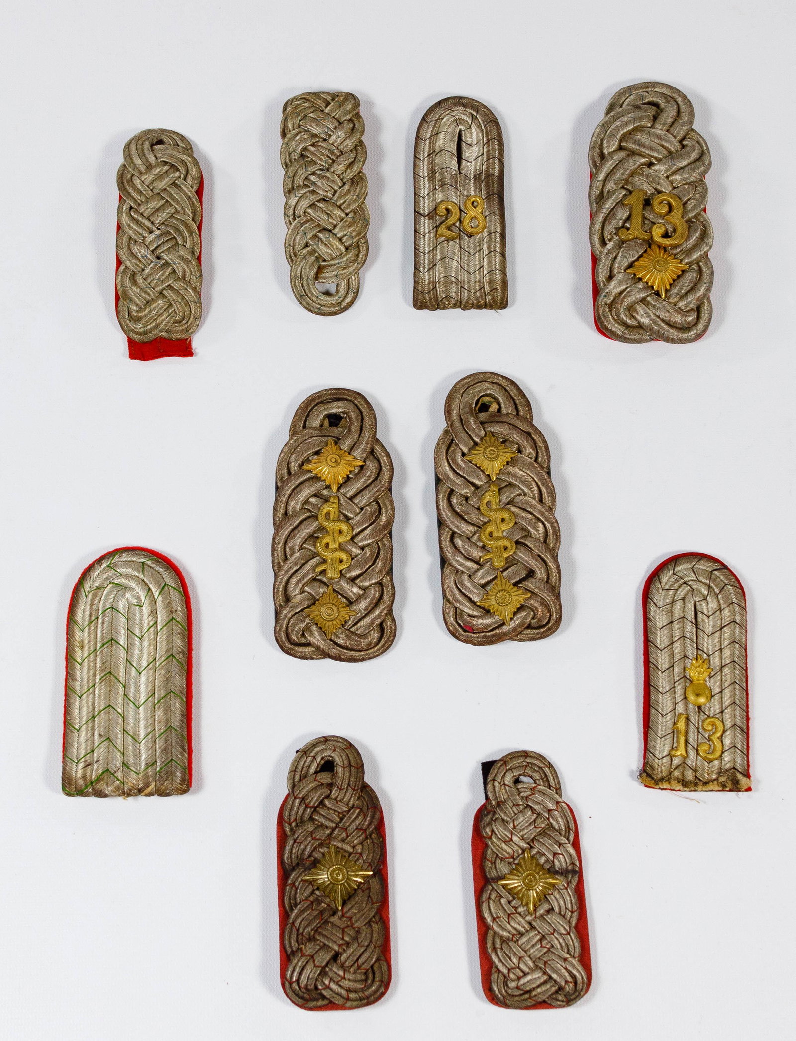 World War I European Epaulet Assortment: World War I European Epaulet Assortment (3) pairs and (4) individual epaulets from multiple countries Property from: the collection of Louis Rossi, Downers Grove, Illinois Length: 5 inches, Width: 2 1