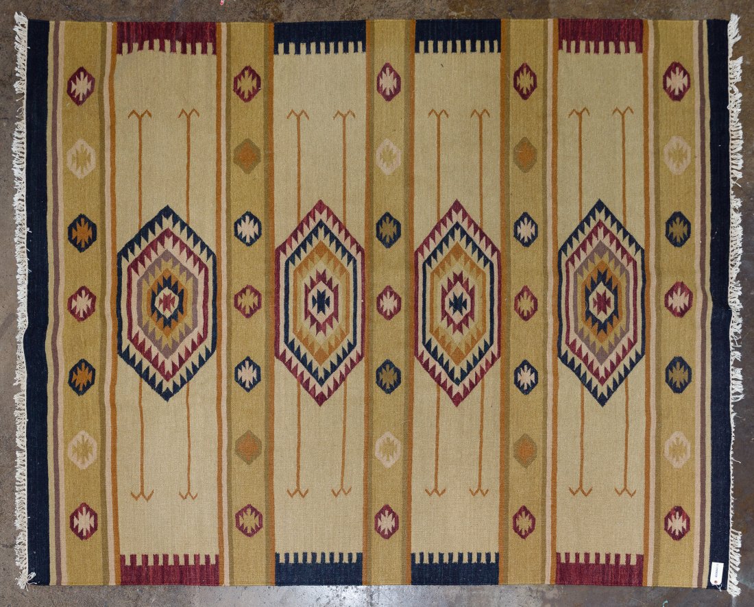 Central American Woven Rug: Central American Woven Rug Geometric fringed rug having a light and dark striped gold and tan ground using red, black and gold tones to create the design; white fringe on both ends Length: 122 inches,
