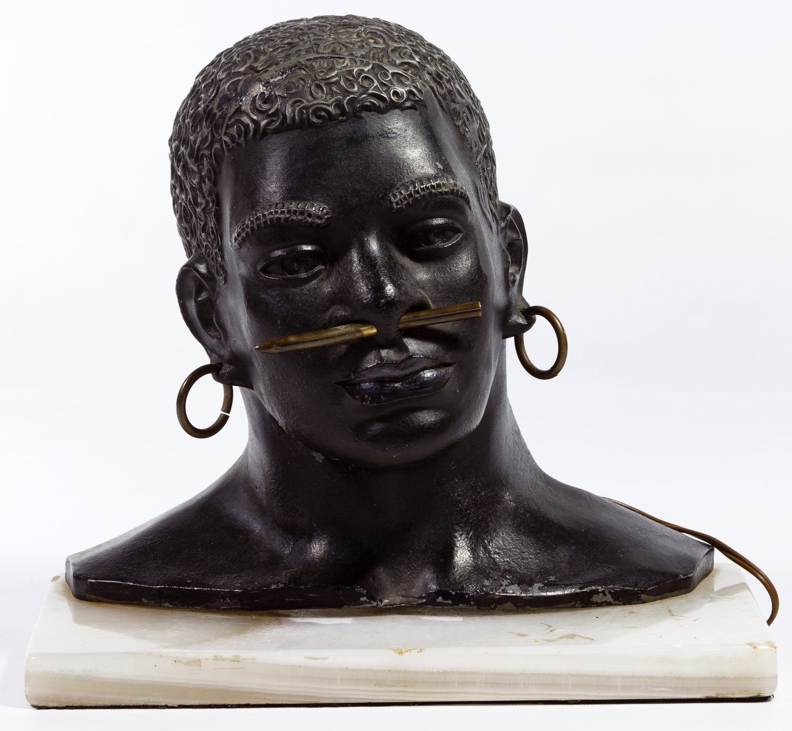 (Attributed to) Karl Hagenauer (Austria, 1898-1956): (Attributed to) Karl Hagenauer (Austria, 1898-1956) Bronze Lamp Statue Undated, unsigned, African face in bronze having black painted finish and brass accents, mounted on marble base and having electr