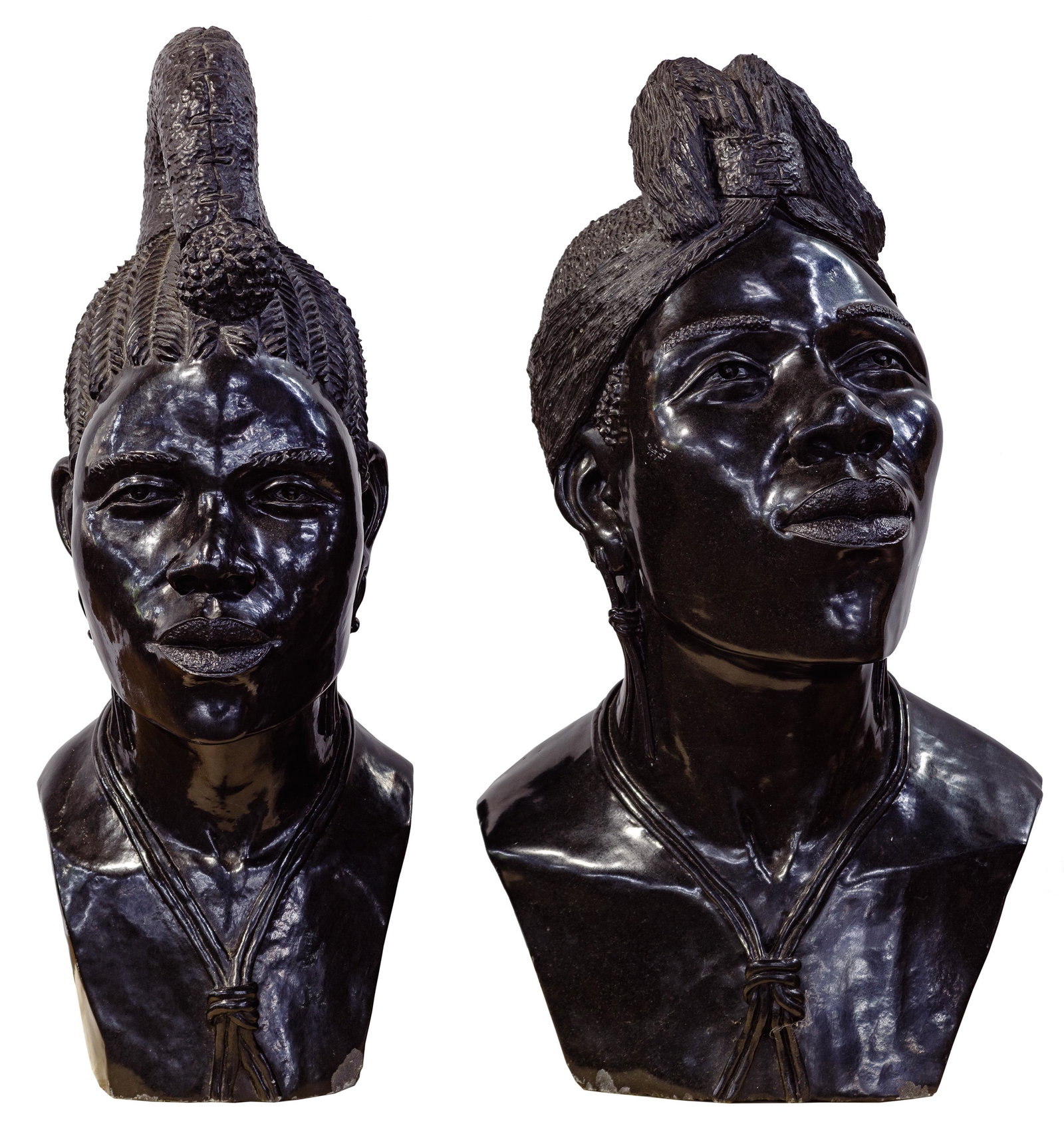 Darios Chikumbirke (Zimbabwean, 20th Century) Carved: Darios Chikumbirke (Zimbabwean, 20th Century) Carved Stone Shona Busts Two black stone busts of Shona tribesmen, both signed on side of left shoulder Height: 29 inches, Width: 10 1/2 inches, Depth: 15
