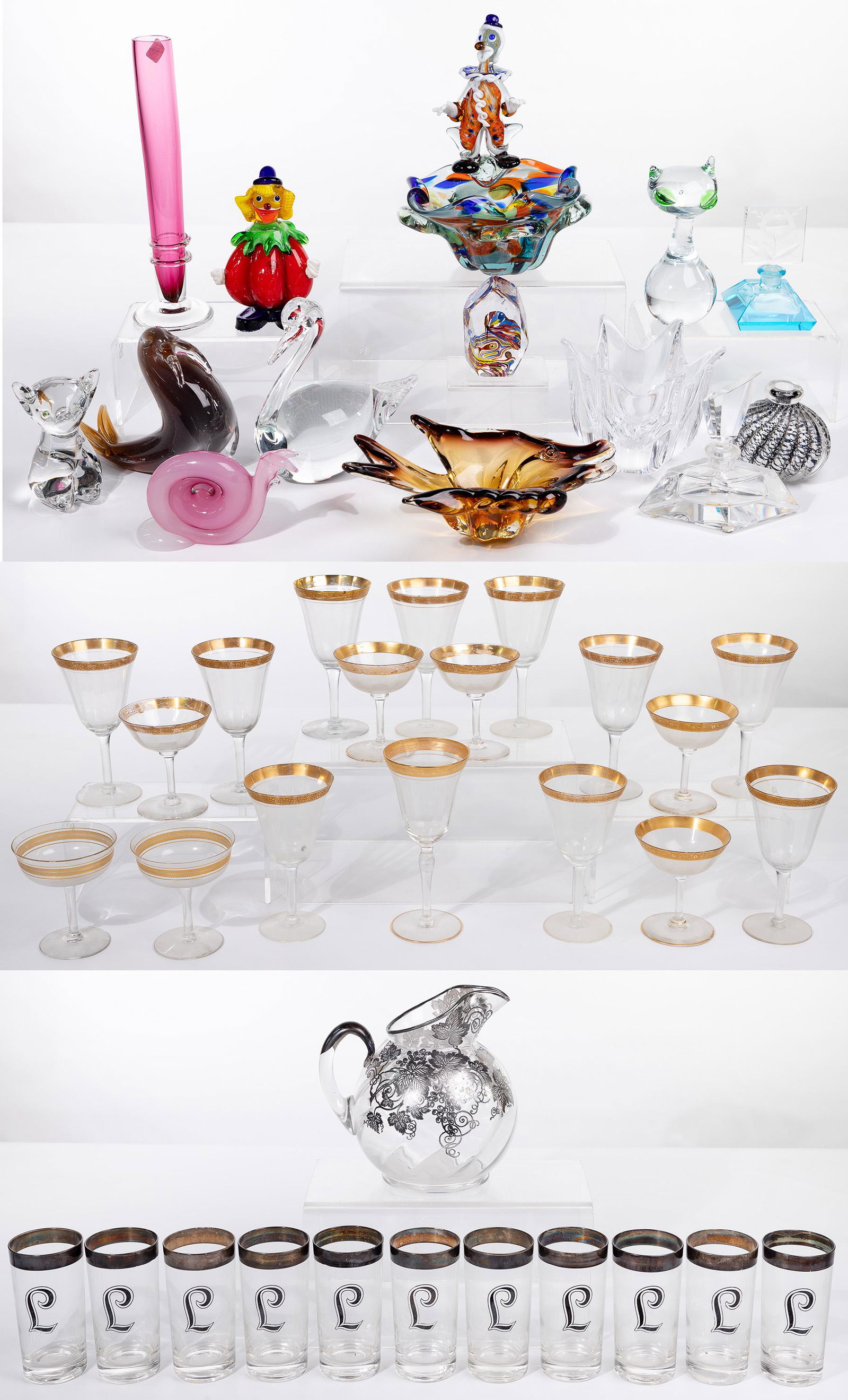 Glass Assortment: Glass Assortment (41) items including (11) silver rimmed tumblers having an 'L' monogram; silver overlay lemonade pitcher; (11) gold rimmed goblets; (7) gold rimmed sherbets; variety of art glass incl