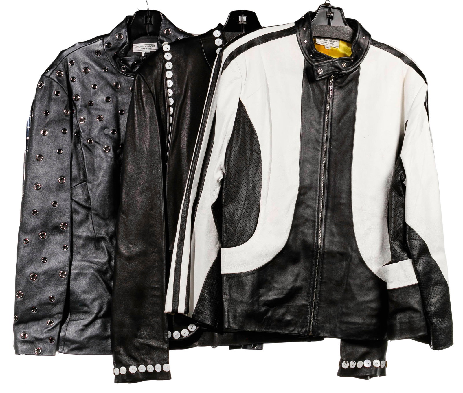 Marie Gray for St. John Leather Jacket Assortment: Marie Gray for St. John Leather Jacket Assortment (3) items including a black jacket having pearl white button accent trim, black silk lining and a zipper closure (size 14); black and white lined jack