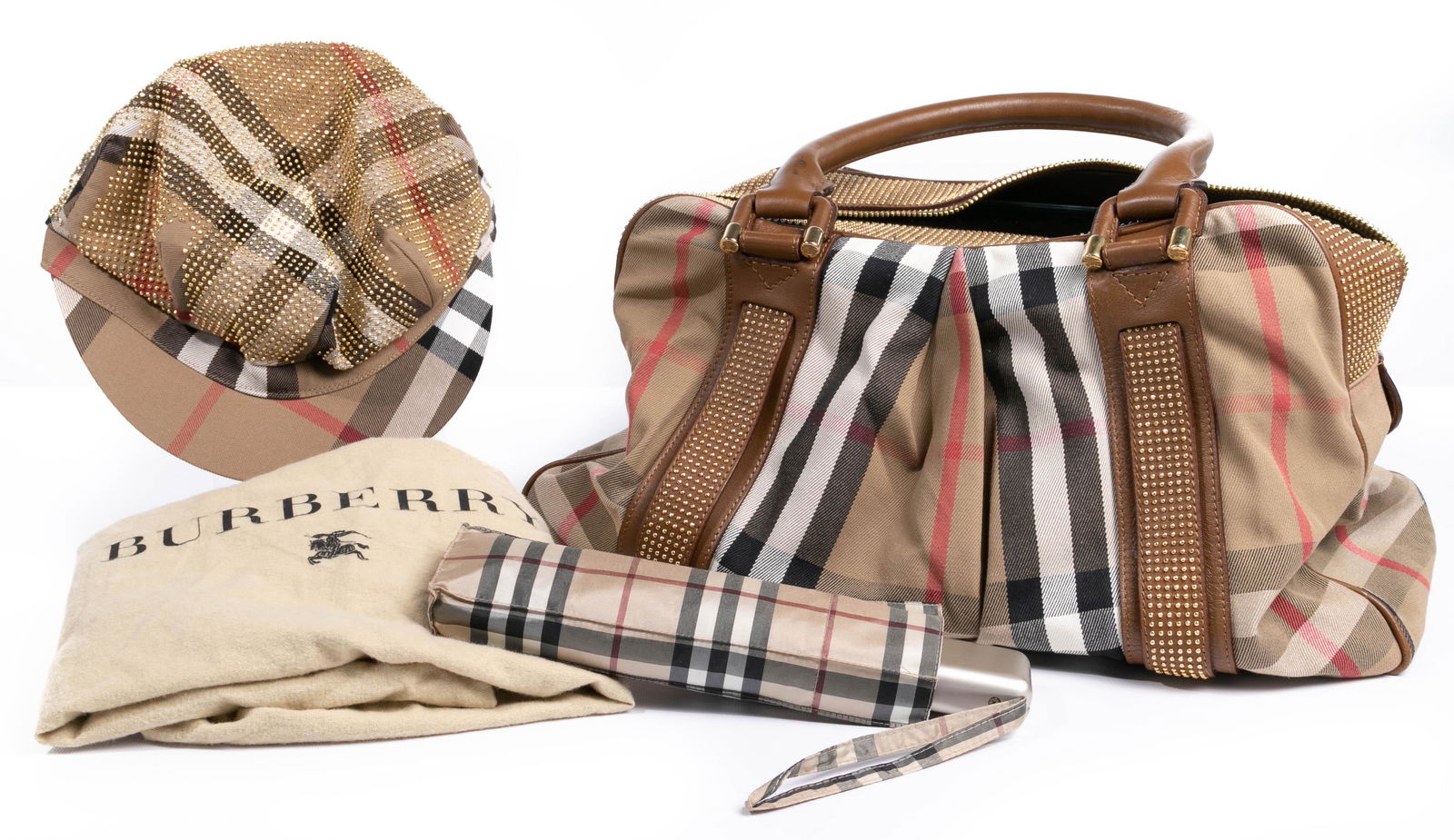 Burberry Assortment: Burberry Assortment (3) items including a 'Super Nova' handbag; newsboy cap having gold-tone stud embellishments; and a purse-size umbrella; purse having storage bag Height: 17 1/2 inches, Width: 18 1