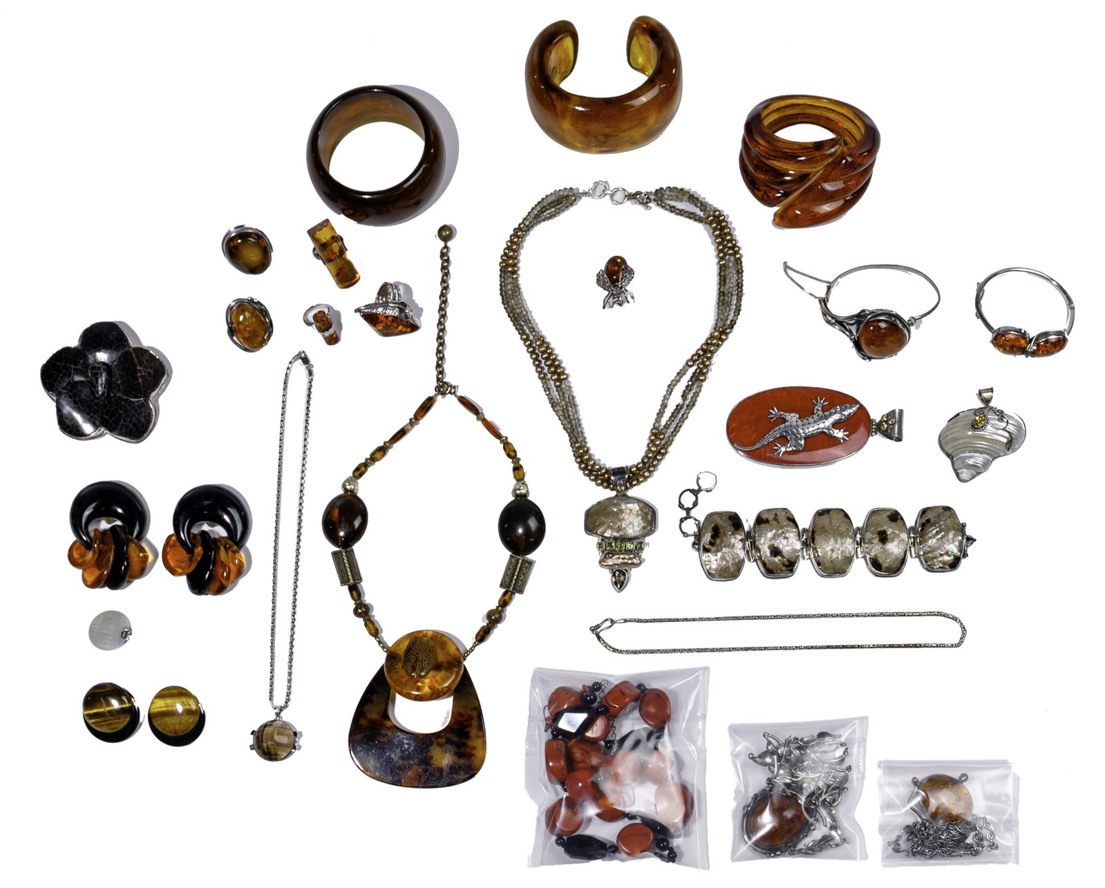 Sterling Silver, Amber, Coral and Tiger Eye Jewelry: Sterling Silver, Amber, Coral and Tiger Eye Jewelry Assortment Including rings, bracelets, earrings, pins, pendants and necklaces; most having amber, coral or tiger eye; most marked '925'; amber and t