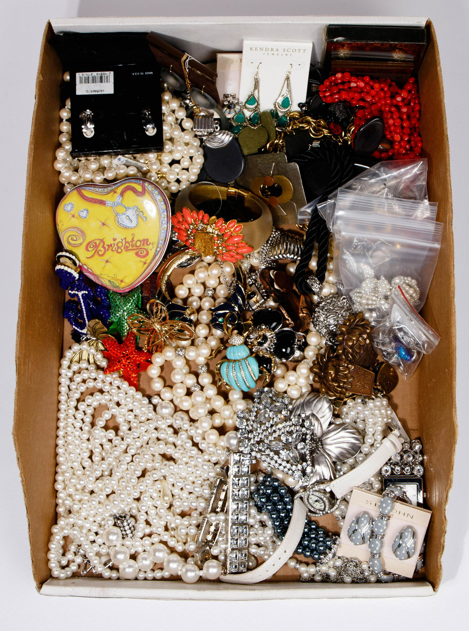 Designer Costume Jewelry Assortment: Designer Costume Jewelry Assortment Approximately (10) pounds including designers Erwin Pearl, St. John, Jarin, Brighton, Swarovski, Kendra Scott, Juicy Couture, Alexis Bittar, Richard Kerr, Landau an