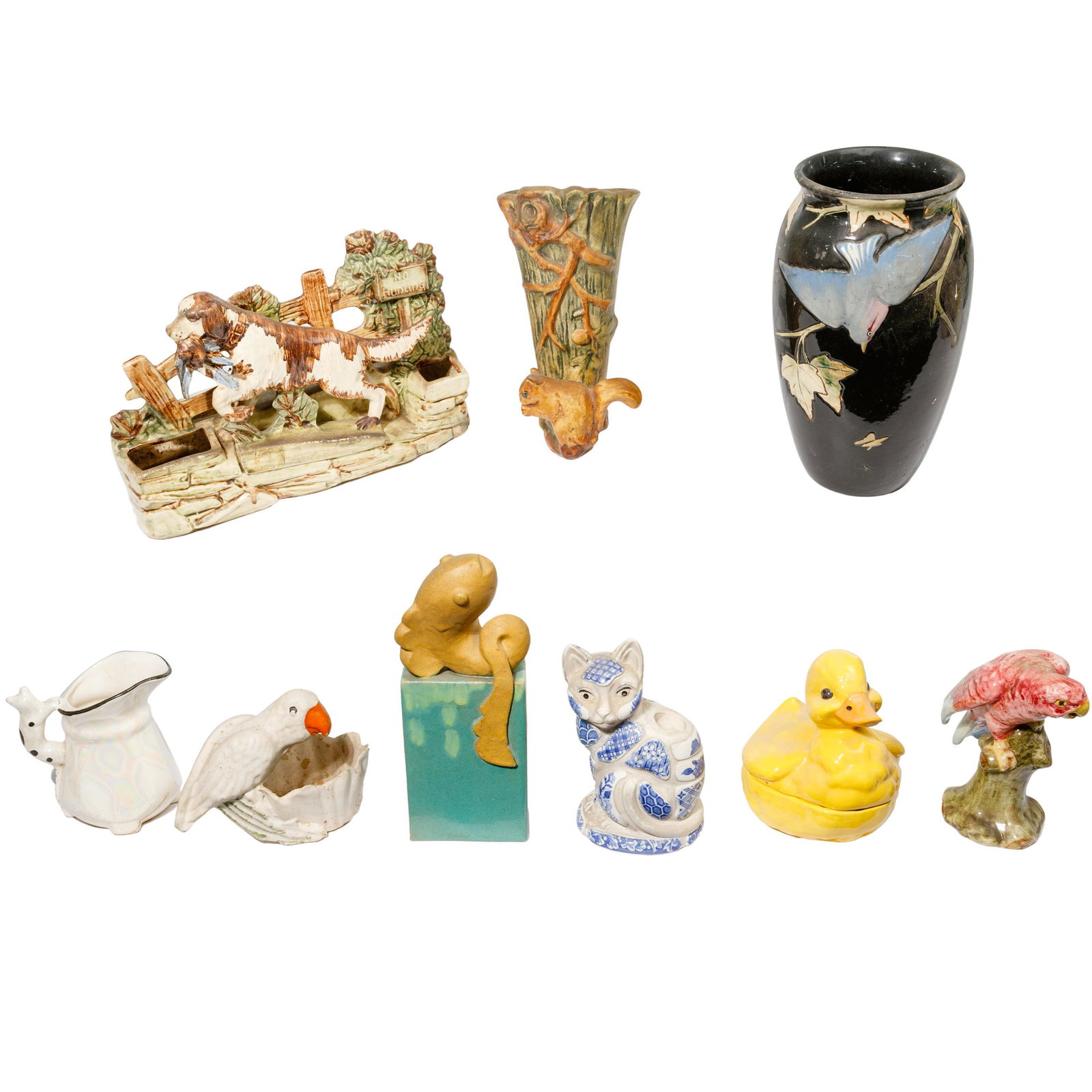 Pottery Animal Assortment: Pottery Animal Assortment (9) items including a bird dog planter having a 'No Hunting' sign marked 'McCoy USA'; bluebirds vase marked 'Weller'; squirrel wall pocket unmarked 'Weller'; blue / white mos