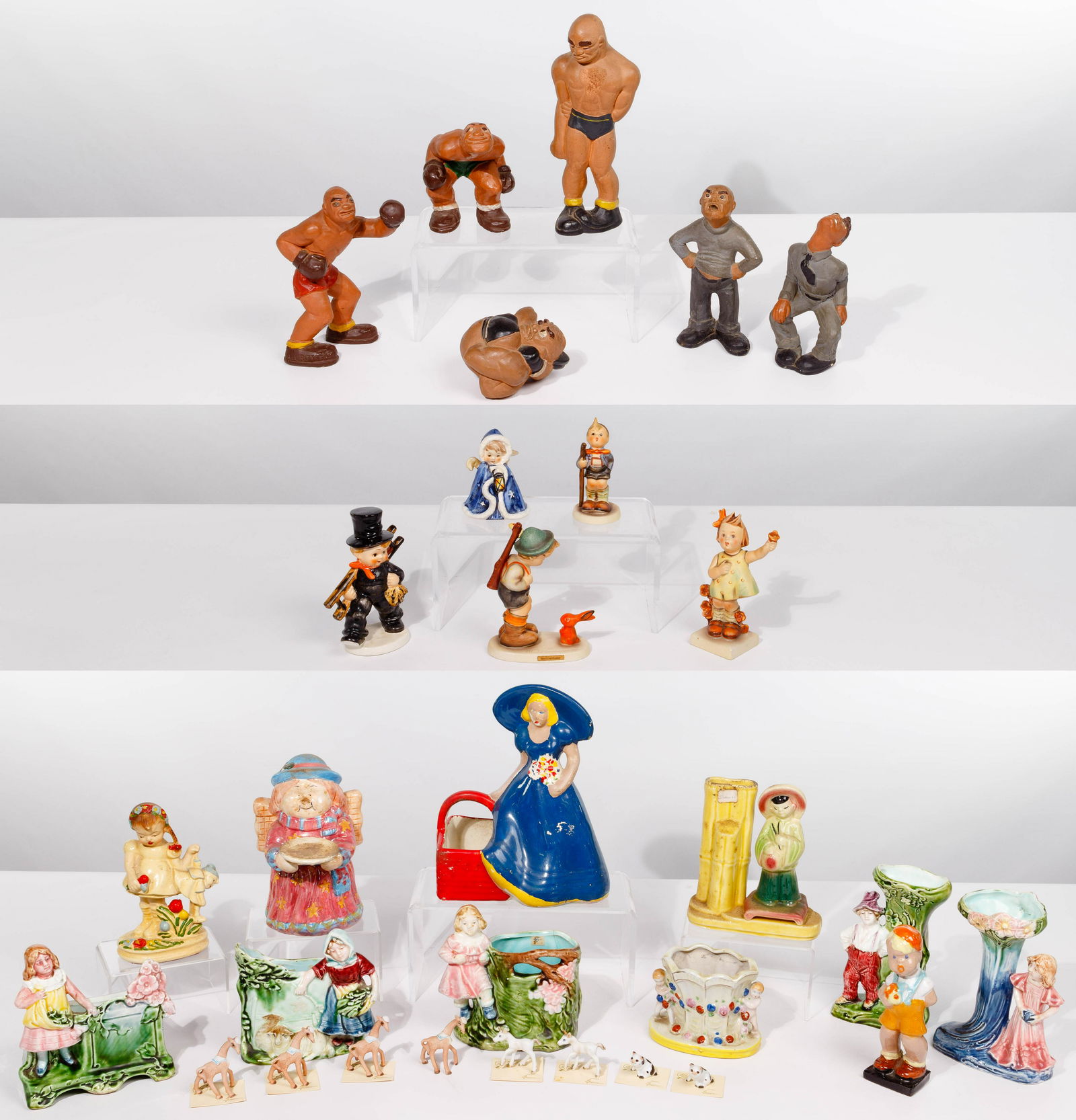 Rittgers Boxing Chalkware and Porcelain Assortment: Rittgers Boxing Chalkware and Porcelain Assortment (19) items featuring (6) chalkware boxing figures as well as porcelain figural vases, planters and statues including examples by Goebel Property from