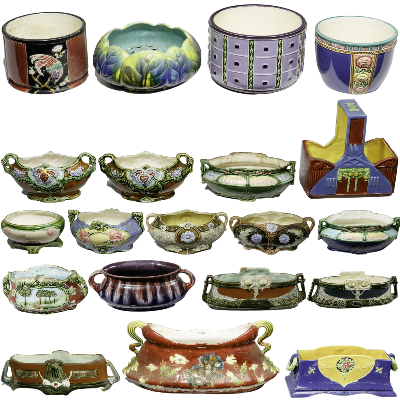 Czechoslovakian Pottery Assortment: Czechoslovakian Pottery Assortment (20) planter and bowl examples including several having embossed 'Eichwald' on underside; most having intricate embossed details and a majolica style glaze Property 