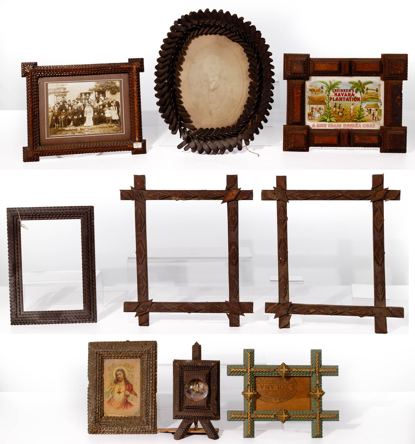 Tramp Art Frame Assortment: Tramp Art Frame Assortment (9) items including an 8-inch by 10-inch oval-opening example assembled from popsicle sticks, containing a faded albumen elder male portrait; chip-carved examples including 
