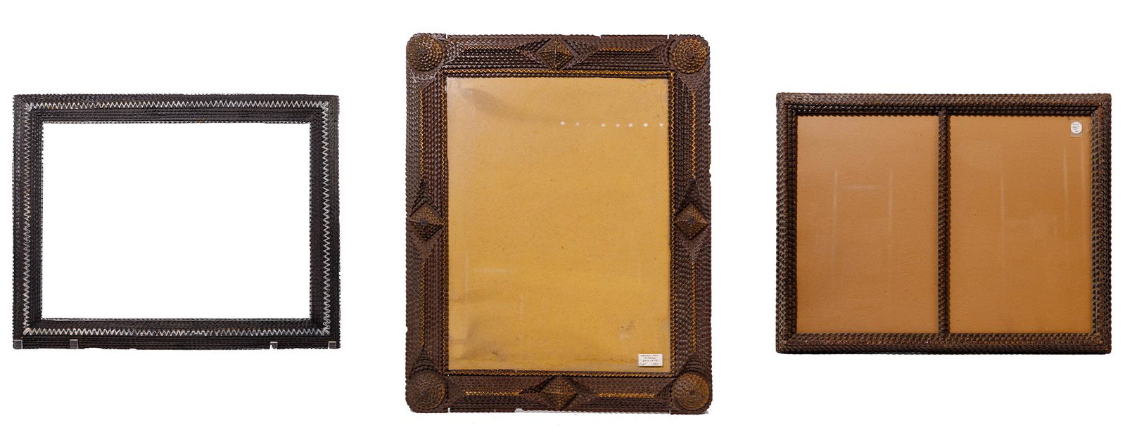 Tramp Art Frame Assortment: Tramp Art Frame Assortment (3) items, assembled using stacked wooden boards having chip carved edges; (2) having glass; (1) having vertical divider over glass Property from: the Joshua B. Kind Trust. 