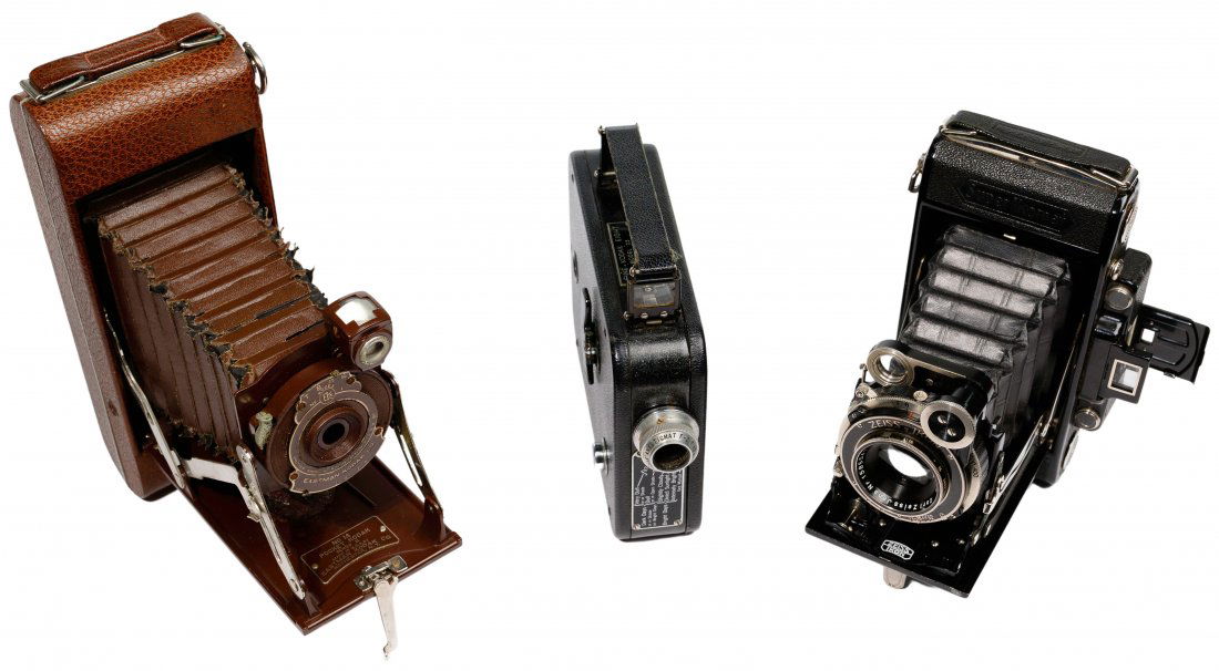 Camera Assortment: Camera Assortment (3) items including a Cine-Kodak Eight model 25 movie camera with original box and instruction booklets; Zeiss Ikon Super Ikomat 530 / 2 folding bellows style with leather case and o