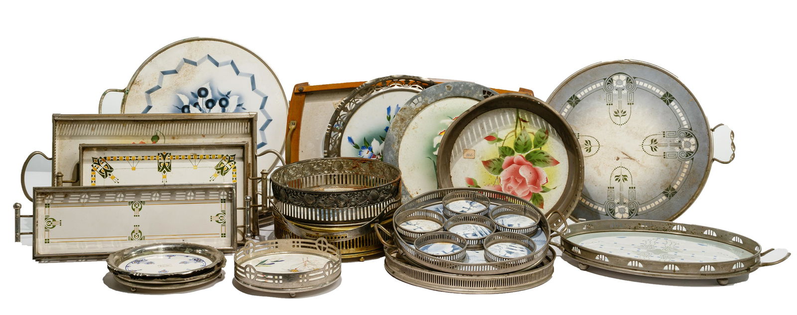 Porcelain and Silverplate Serving Assortment: Porcelain and Silverplate Serving Assortment (19) items including some having an Art Deco style, floral styles, (2) beer tray and coaster sets; most having metal pierced trim; some having handles; one