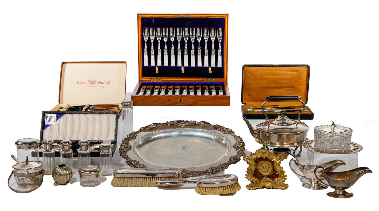 Christofle Silverplate Utensil Assortment: Christofle Silverplate Utensil Assortment (9) Christofle items including ladle, cake server, crumber pan, pierced spoon, butter pick, cocktail fork, (2) wine bottle coasters and a napkin ring; togethe