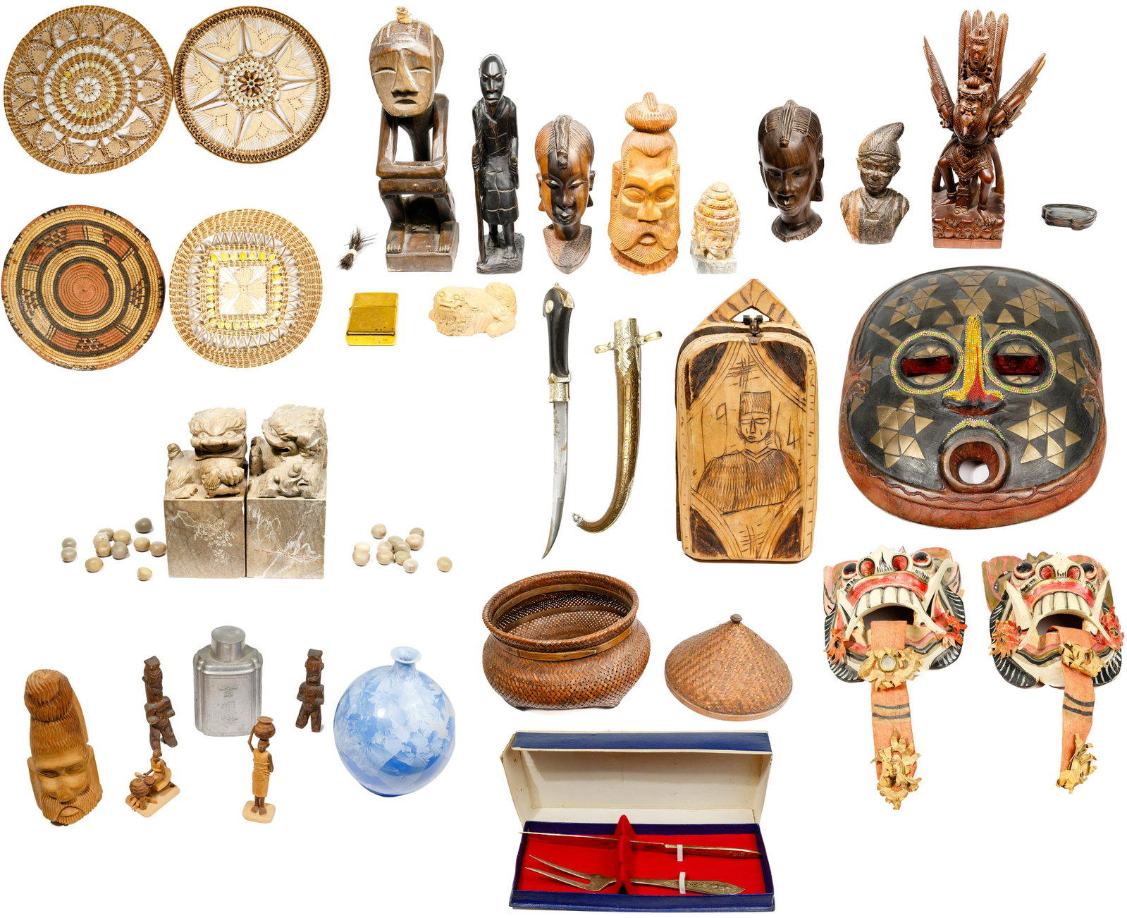 Multi-Cultural Decorative Object Assortment: Multi-Cultural Decorative Object Assortment (32) items including an Islamic dagger / jambiya having an ornate curved sheath with decorative metal; a pair of soapstone foo dog bookends; carved soapston