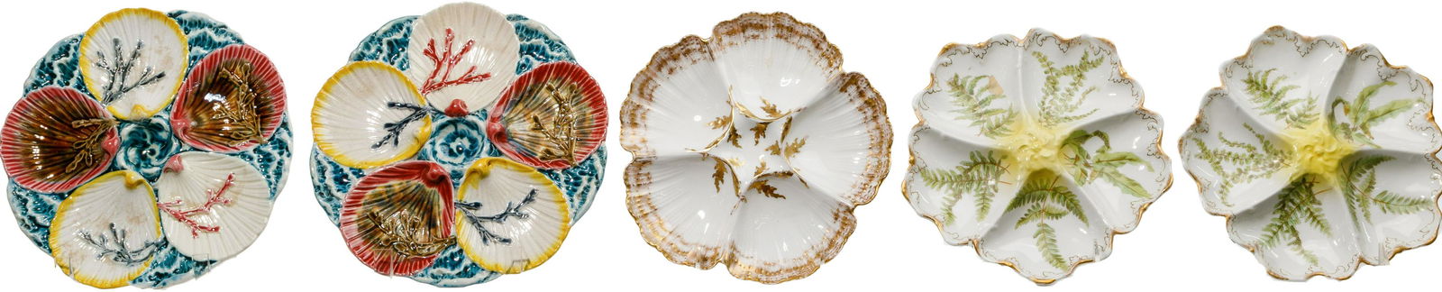 Wedgwood Majolica Oyster Plates: Wedgwood Majolica Oyster Plates Pair having a shell on water motif with Wedgwood stamp on backside; together with (3) T&V French oyster plates Diameter: 9 1/8 inches Condition: Good, Wedgwood having c