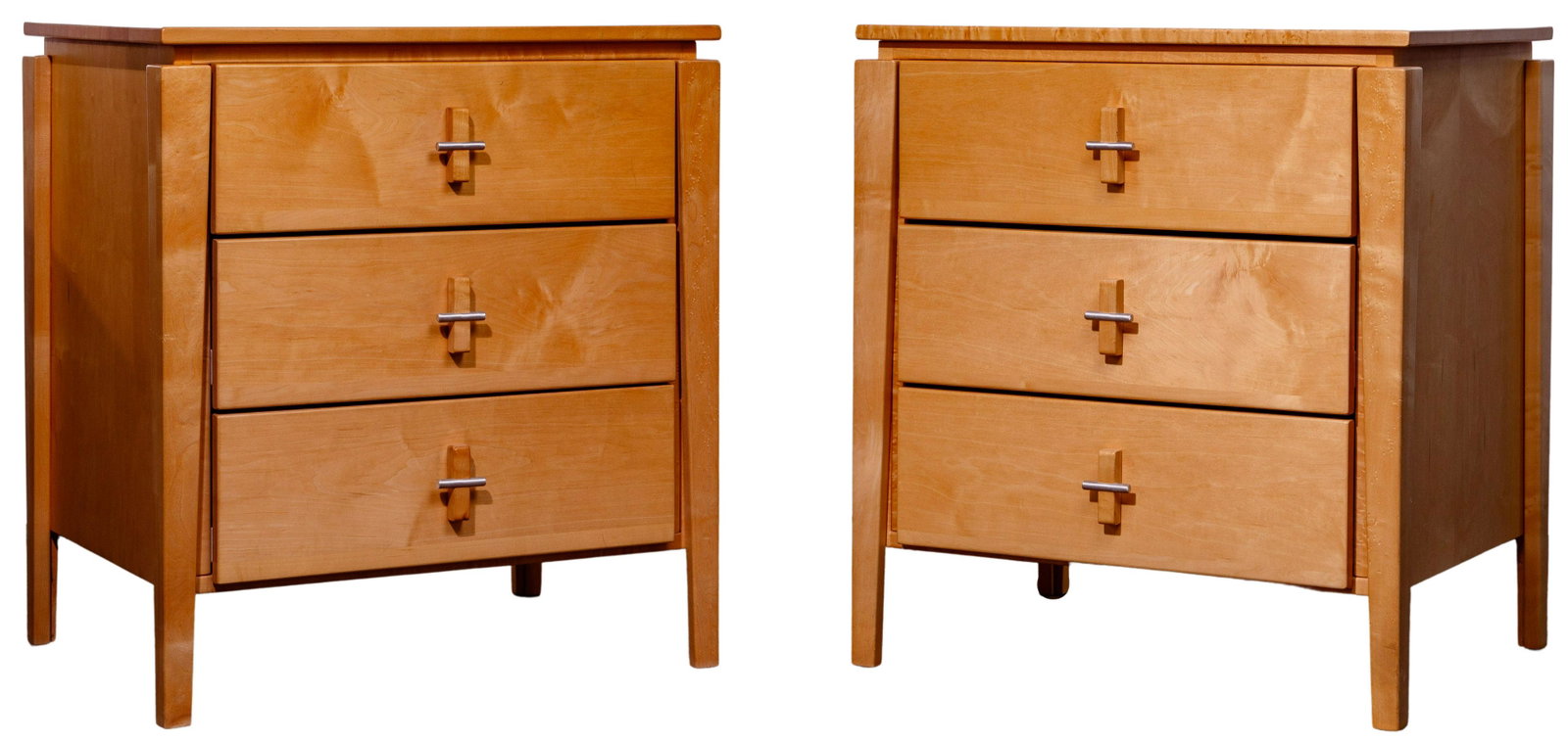 Contemporary Nightstands: Contemporary Nightstands (2) matching items having three pullout drawers with metal and wood handles Height: 27 inches, Width: 19 inches, Depth: 24 inches Condition: Very Good to Good, light surface s