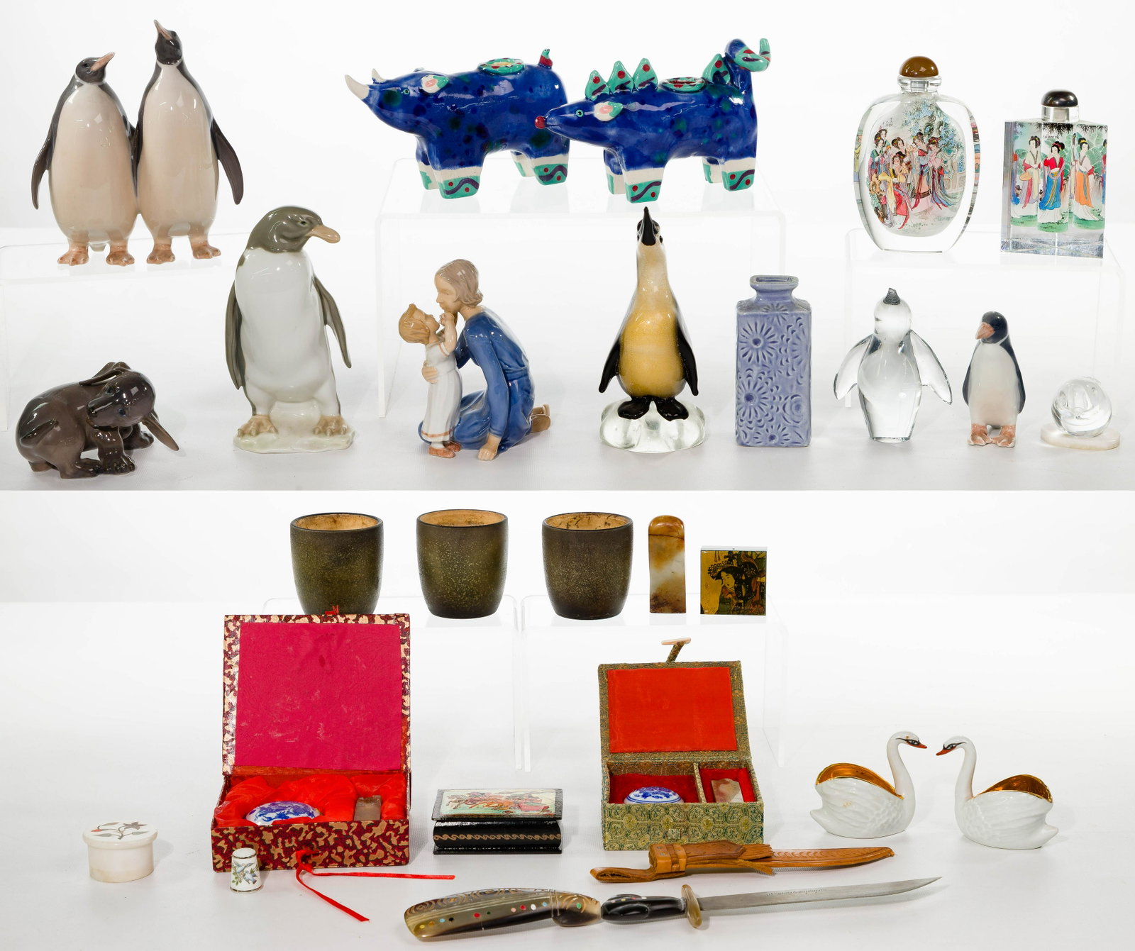 Decorative Object Assortment: Decorative Object Assortment (27) items including (2) Chinese seal stamp kits in silk boxes; (2) Limoges swans; (4) Royal Copenhagen figures including #2918 'Pair of Penguins', #1407 Dachshund Puppy '
