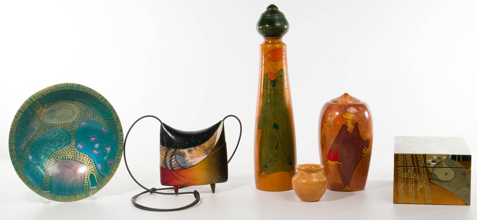 Painted Wood Object Assortment: Painted Wood Object Assortment (6) items including a wearable art purse signed Kathleen Dustin, 2006; (2) Ted Johnson cylinder wood sculptures with one from birch and the other having a painted woman,