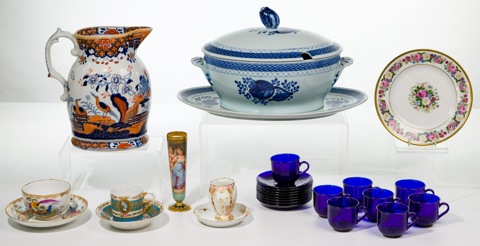 Ironstone, Porcelain and Glass Assortment: Ironstone, Porcelain and Glass Assortment (15) items including a Royal Vienna figural vase having gilt trim; (8) French cobalt blue glass demitasse cup and saucer sets; Masons large ironstone transfer