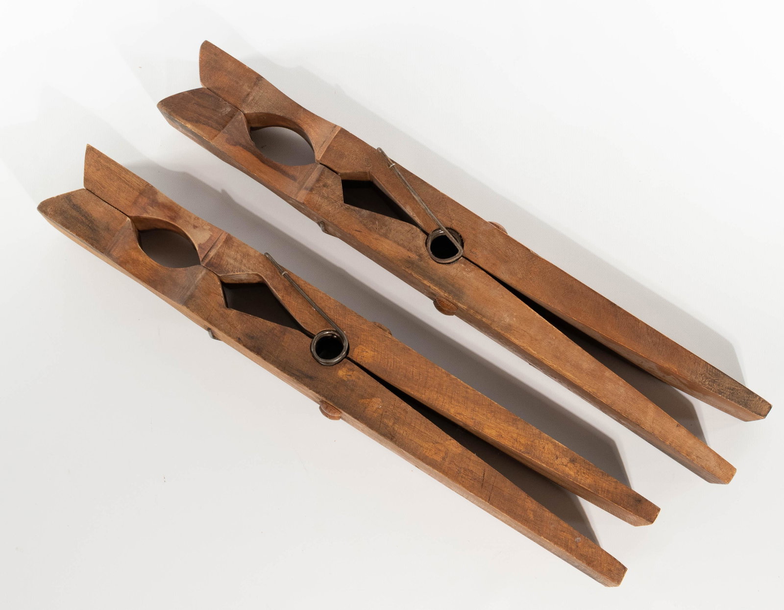 Decorative Store Display Clothespins: Decorative Store Display Clothespins Like pair, wooden with oak pegs; wall hangings or shelves Length: 21 3/8 inches, Width: 3 inches Condition: Good, light wear; minor scuffs, scratches, nicks and st