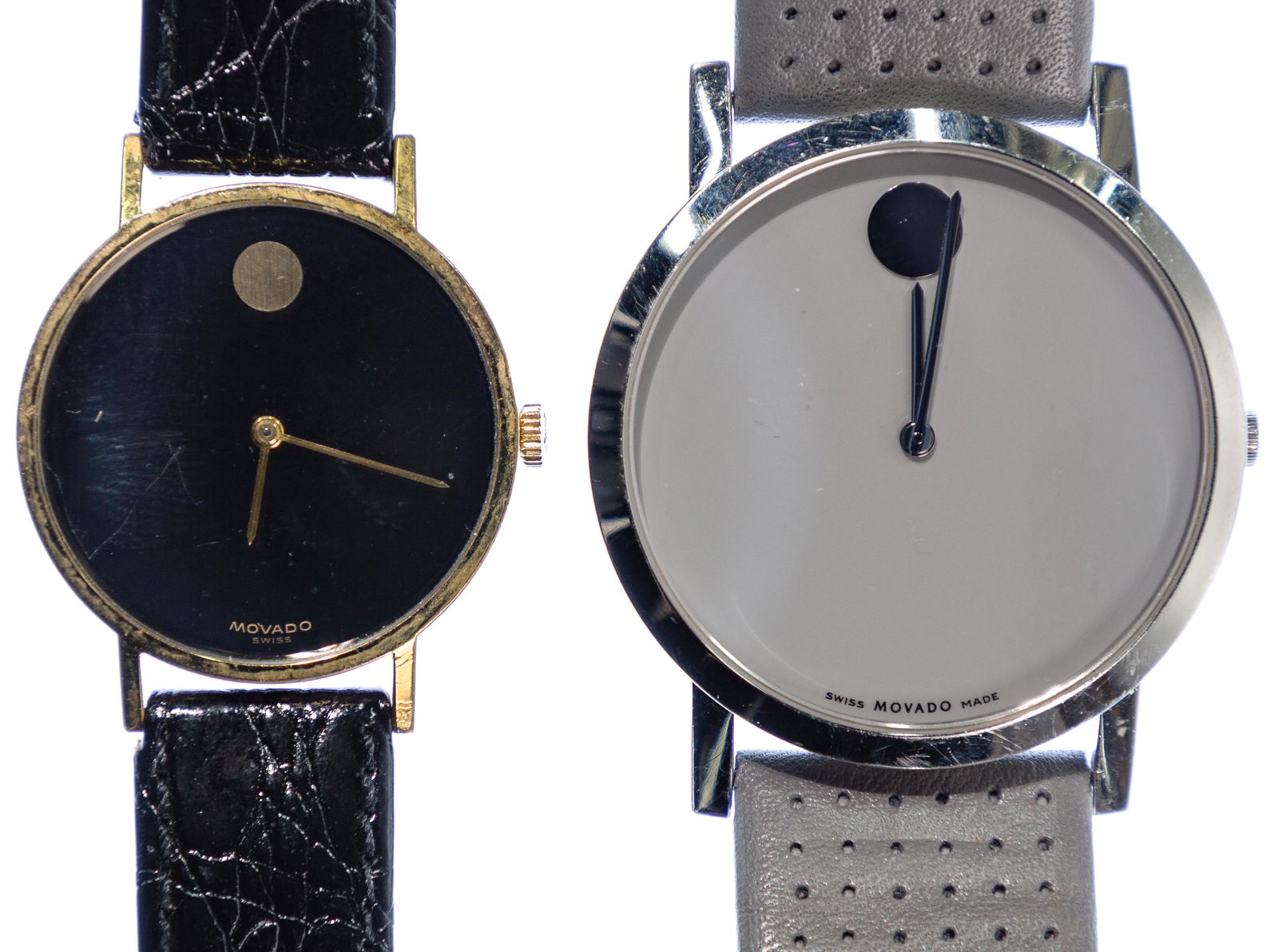 Movado 'Museum' Wrist Watches: Movado 'Museum' Wrist Watches (2) watches including a pale gray #84 G1 1855 on leather band and a black and gold-tone #27.0520.305 on a black leather band Length: 6 inches (adjustable to 8.25-inches (