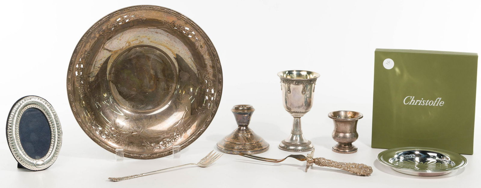 Sterling Silver Hollowware, Flatware and Object: Sterling Silver Hollowware, Flatware and Object Assortment (7) items including a pierced serving bowl, an embossed chalice, a pickle fork, a meat fork, oval frame, toothpick holder and a candle holder