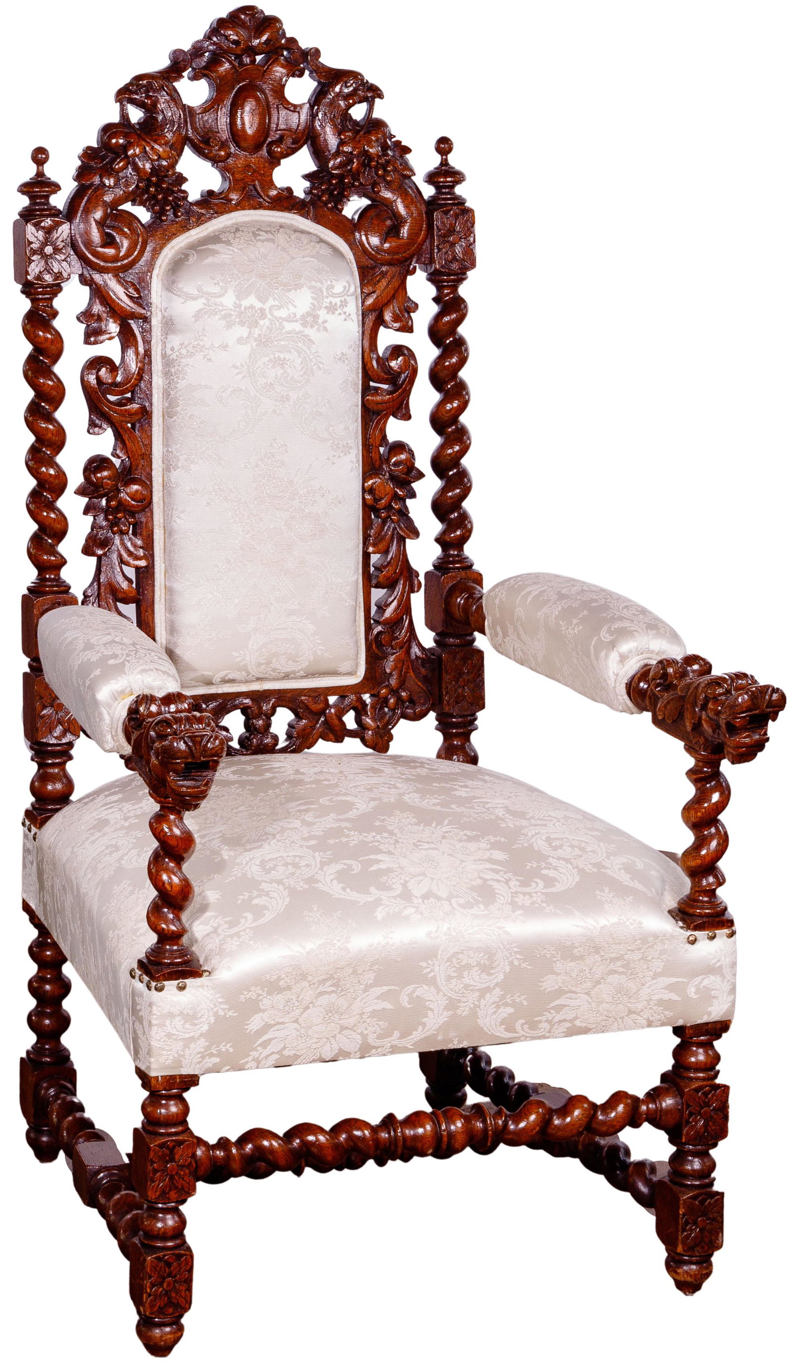 Throne-Style Mahogany Armchair: Throne-Style Mahogany Armchair Having a carved wood frame with overall botanical motif, falcons at top, lions at front of arm rests; white brocade upholstery Property from: a Westmont, Illinois estate