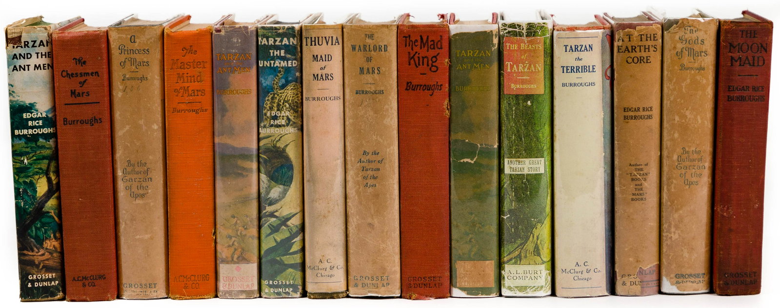 Edgar Rice Borroughs Book Assortment: Edgar Rice Borroughs Book Assortment (15) items including 'The Beasts of Tarzan', McClurg, 1916, 1st edition having an A. L. Burt dust wrapper; 'Tarzan the Terrible', McClurg, 1921, 1st edition having