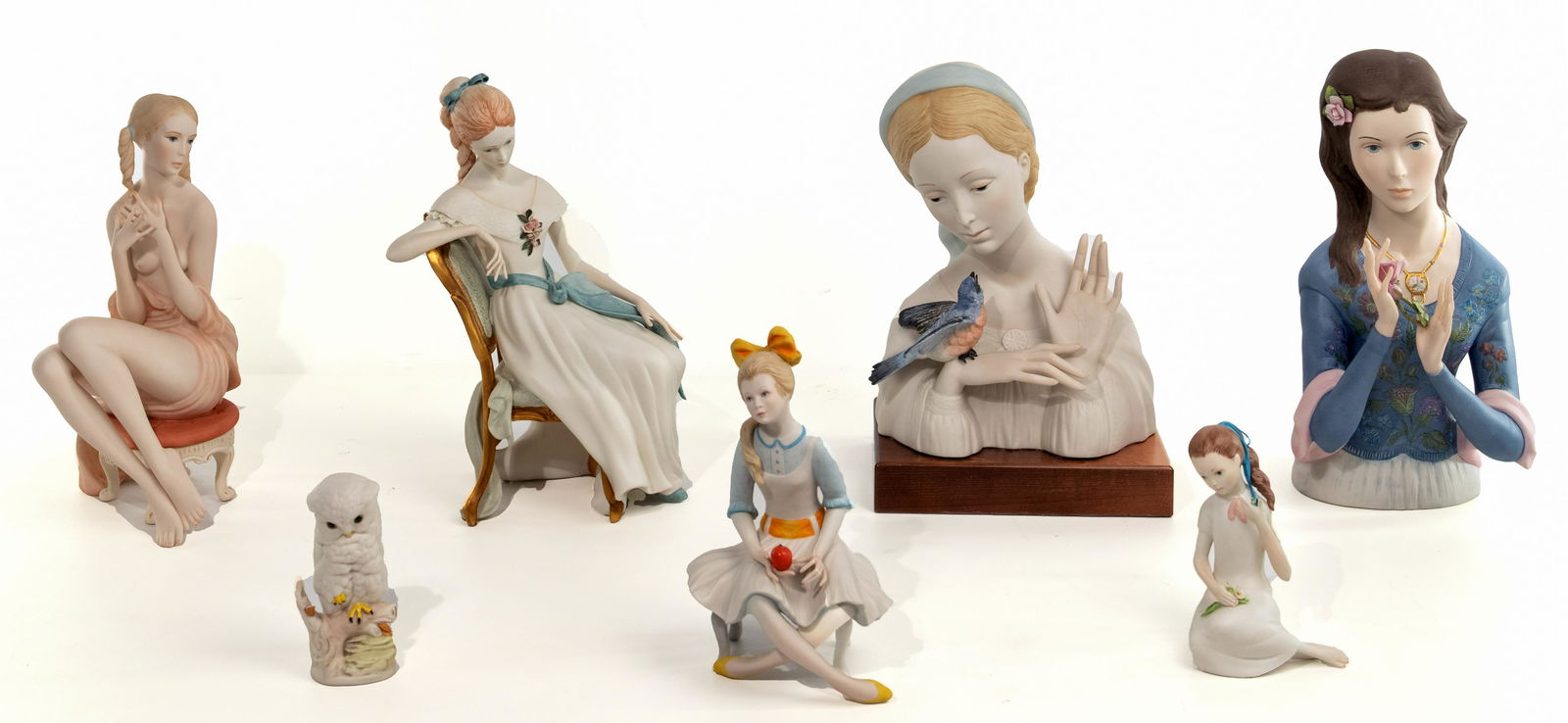 Ispanky and Cybis Bisque Porcelain Figurine Assortment: Ispanky and Cybis Bisque Porcelain Figurine Assortment (7) items including (2) Laszlo Ispanky limited edition figurines depicting a female bust holding two roses marked '461 of 500' on underside and f