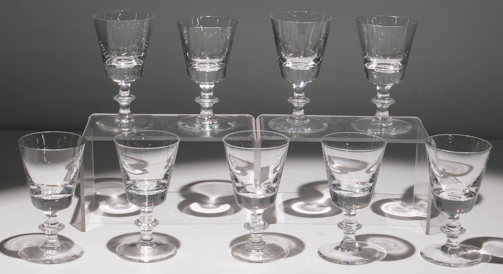 Steuben and Val St. Lambert Crystal Assortment: Steuben and Val St. Lambert Crystal Assortment (44) items including a Steuben compote etch signed on underside; (10) Val St. Lambert 'State Plain' water goblets, etch marked 'VSL' on underside; unmark