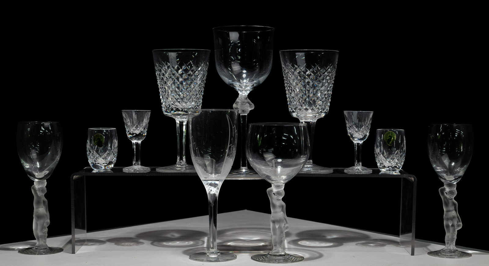 Lalique and Waterford Crystal Stemware Assortment: Lalique and Waterford Crystal Stemware Assortment (8) items including Lalique 'Roxane' wine glass and 'Soure de Ange' wine glass, both etch signed on underside; Waterford (2) 'Alana' goblets, (2) 'Lis