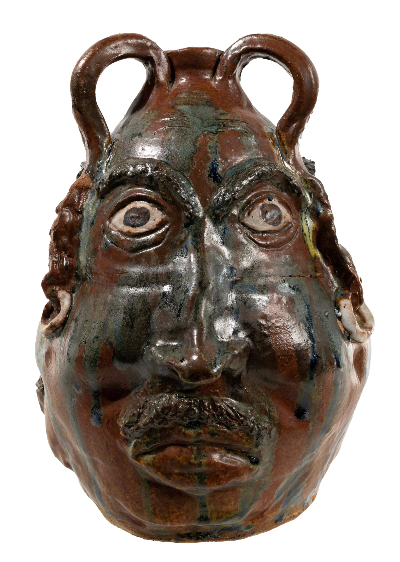 Betty Jo (BJ) Cabe (American, 1925-2008) Ugly 3-Face: Betty Jo (BJ) Cabe (American, 1925-2008) Ugly 3-Face Pottery Jug Undated, incised signature on underside, hand molded, having overall reddish-brown glaze with green-blue glazed drips running from top