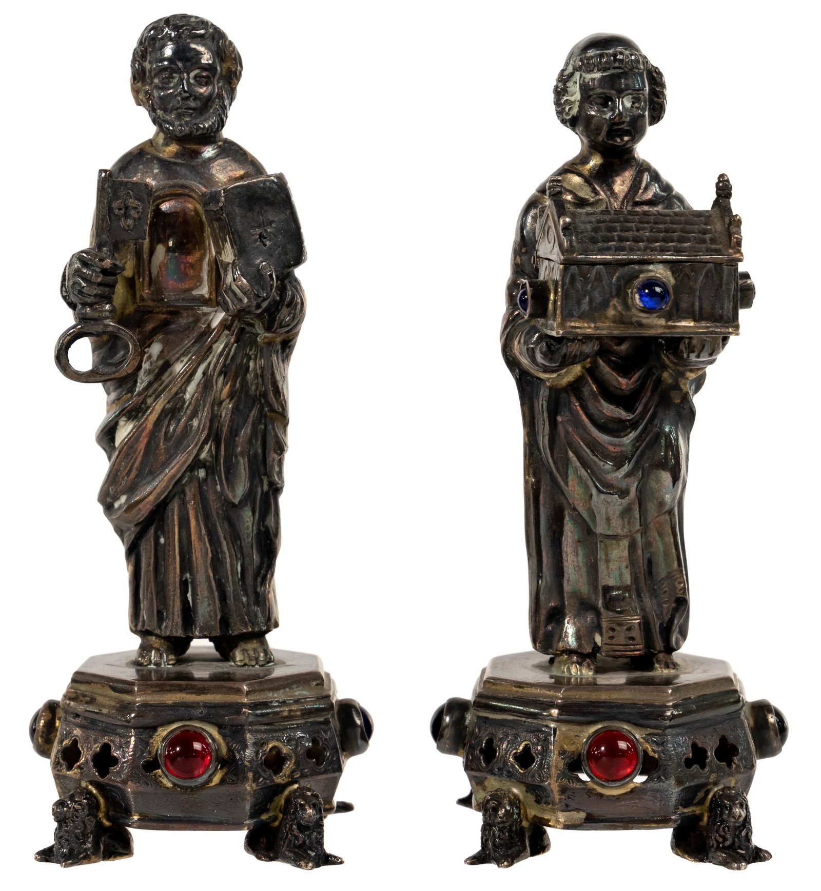 Hanau German Silver Saint Figurines: Hanau German Silver Saint Figurines (2) items including depicting St Peter; and a figure holding a casket having gemstones, hallmark on the underside Provenanc