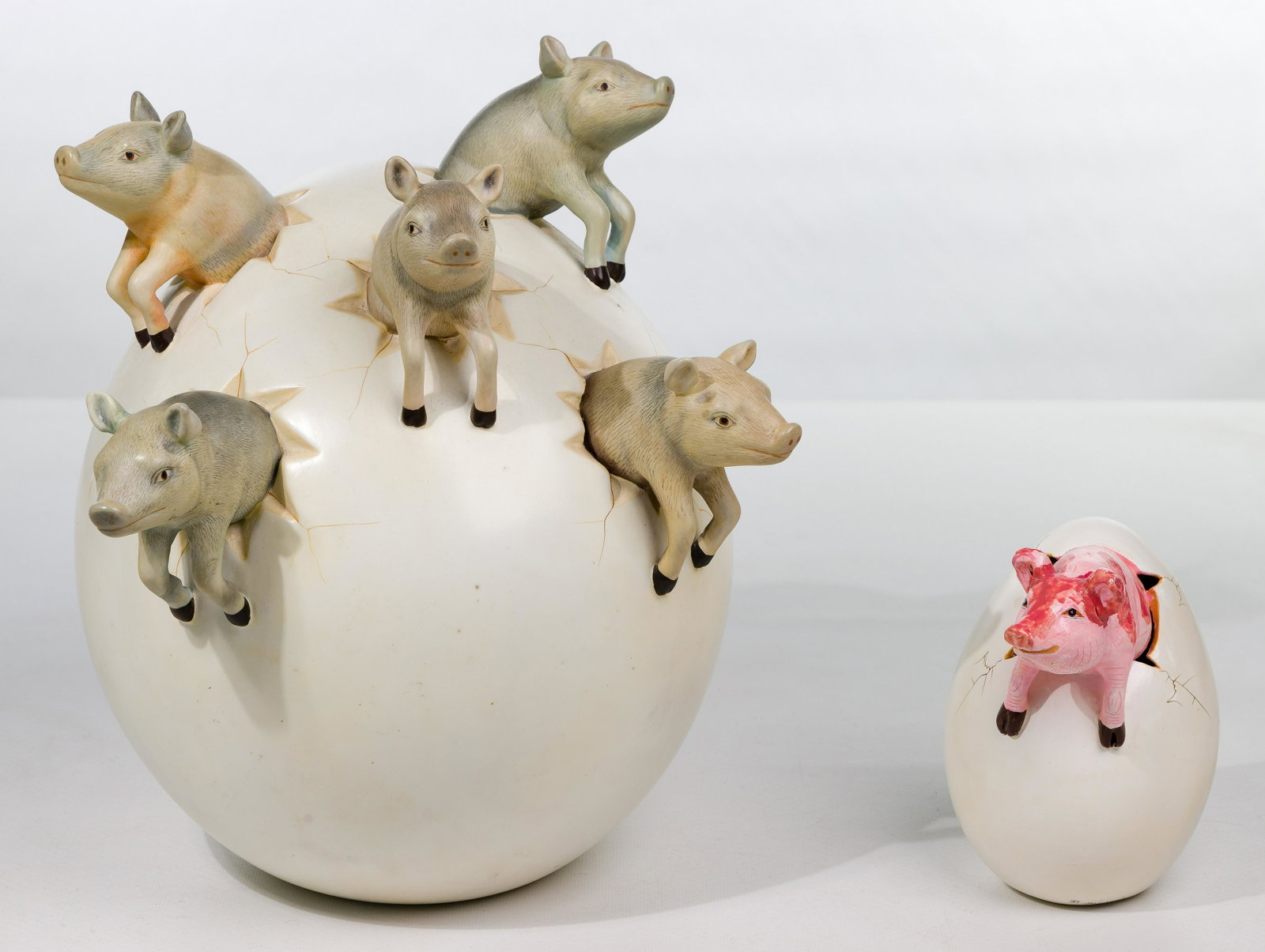 Sergio Bustamante (Mexican, b.1949) 'Pig Egg' Resin: Sergio Bustamante (Mexican, b.1949) 'Pig Egg' Resin Sculpture Undated, signed beneath top pig, depicting (5) pigs emerging from an egg; together with an R. Miranda cera