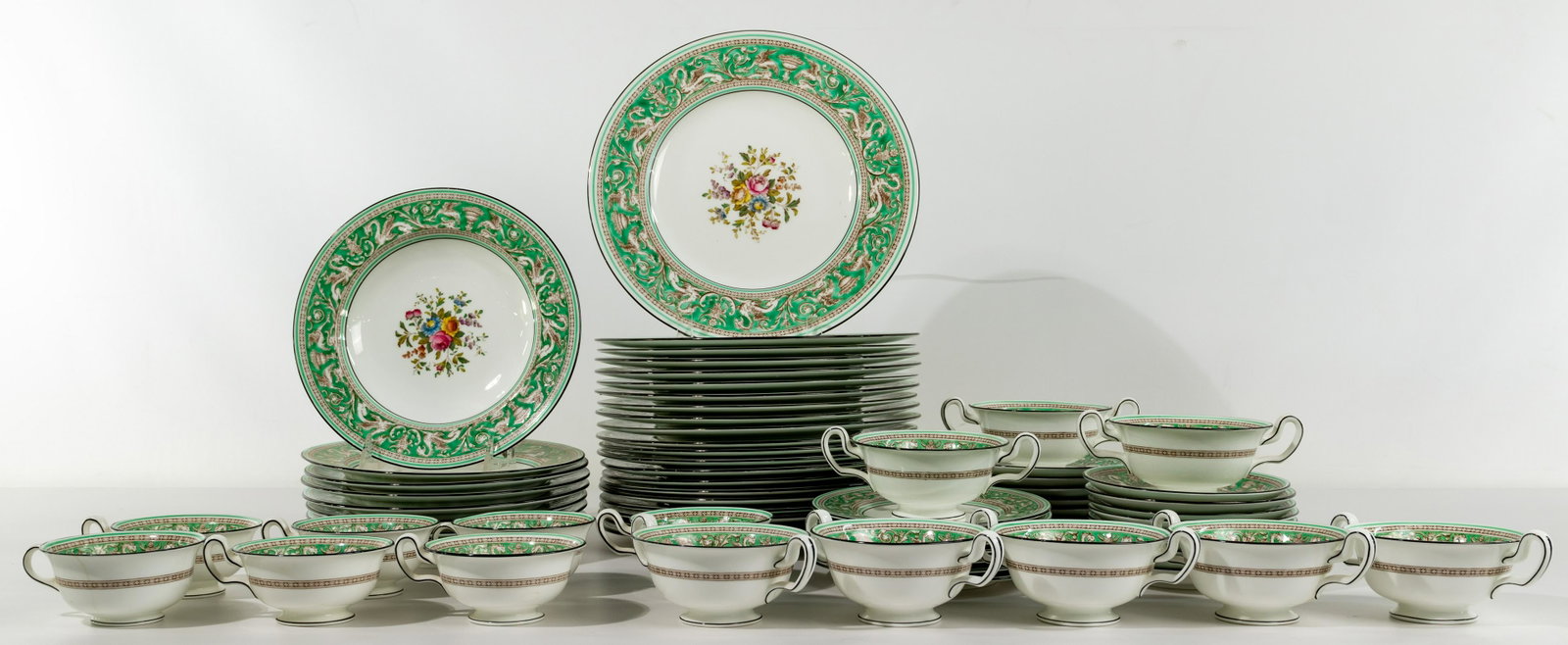 Wedgwood 'Florentine' Bone China Service: Wedgwood 'Florentine' Bone China Service (68) items including (12) dinner plates without floral decor, (9) floral dinner plates, (8) rimmed soup bowls, (7) peony-shaped