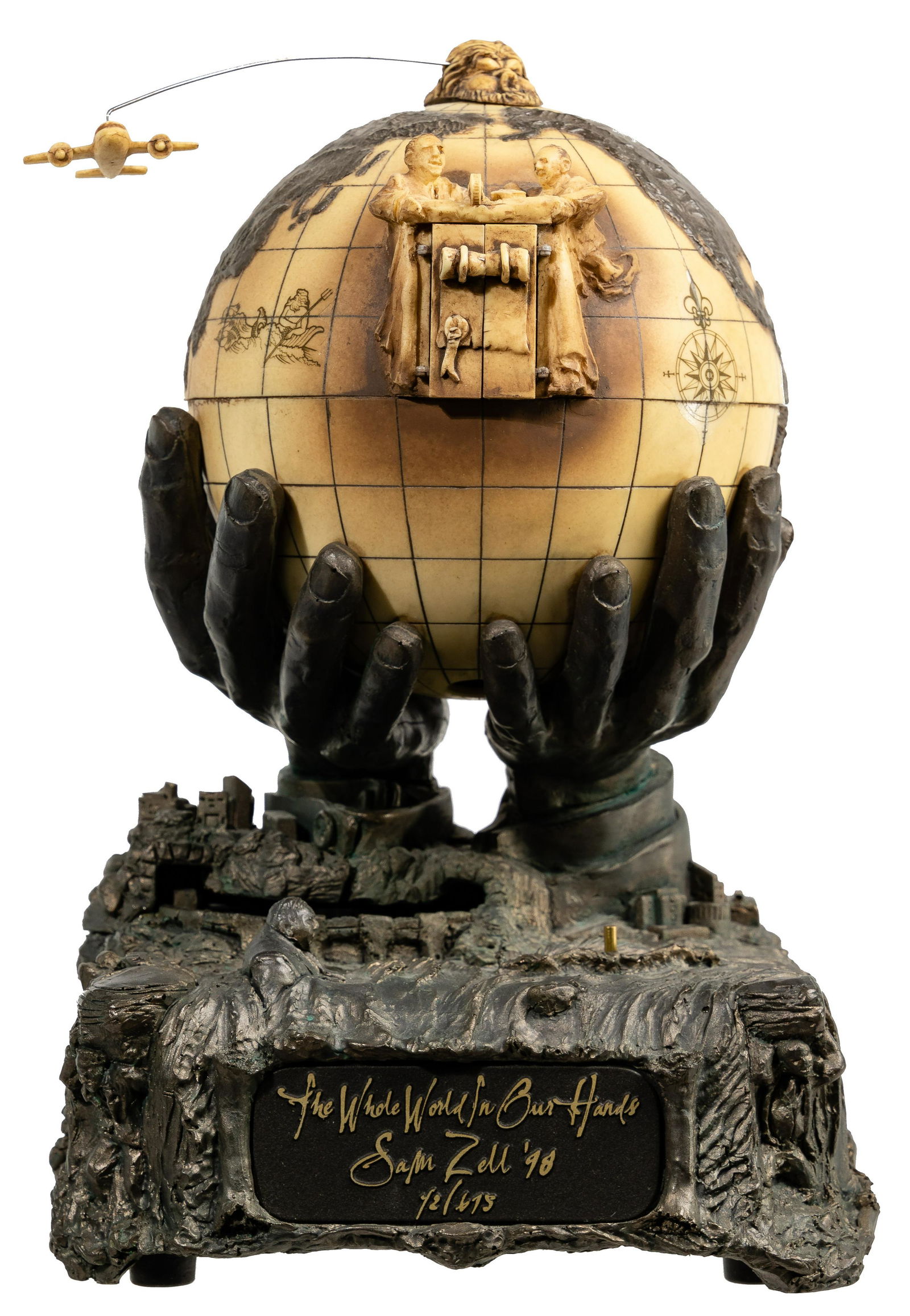 Sam Zell Composition 'The Whole World in Our Hands': Sam Zell Composition 'The Whole World in Our Hands' Musical Automation 1998, signed and numbered on front plaque #42/675, depicting hands holding a globe having figural