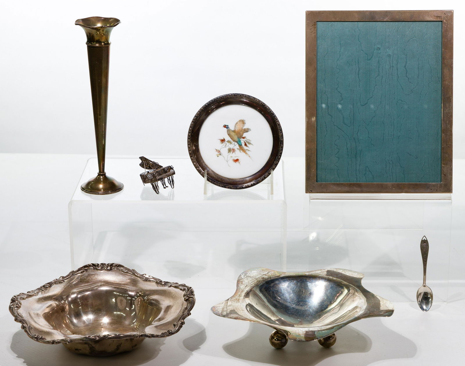 Sterling Silver Object Assortment: Sterling Silver Object Assortment (7) items including a picture frame, (2) bowls, a vase, souvenir spoon, wine coaster and filigree piano; all marked 'sterling' / '925'