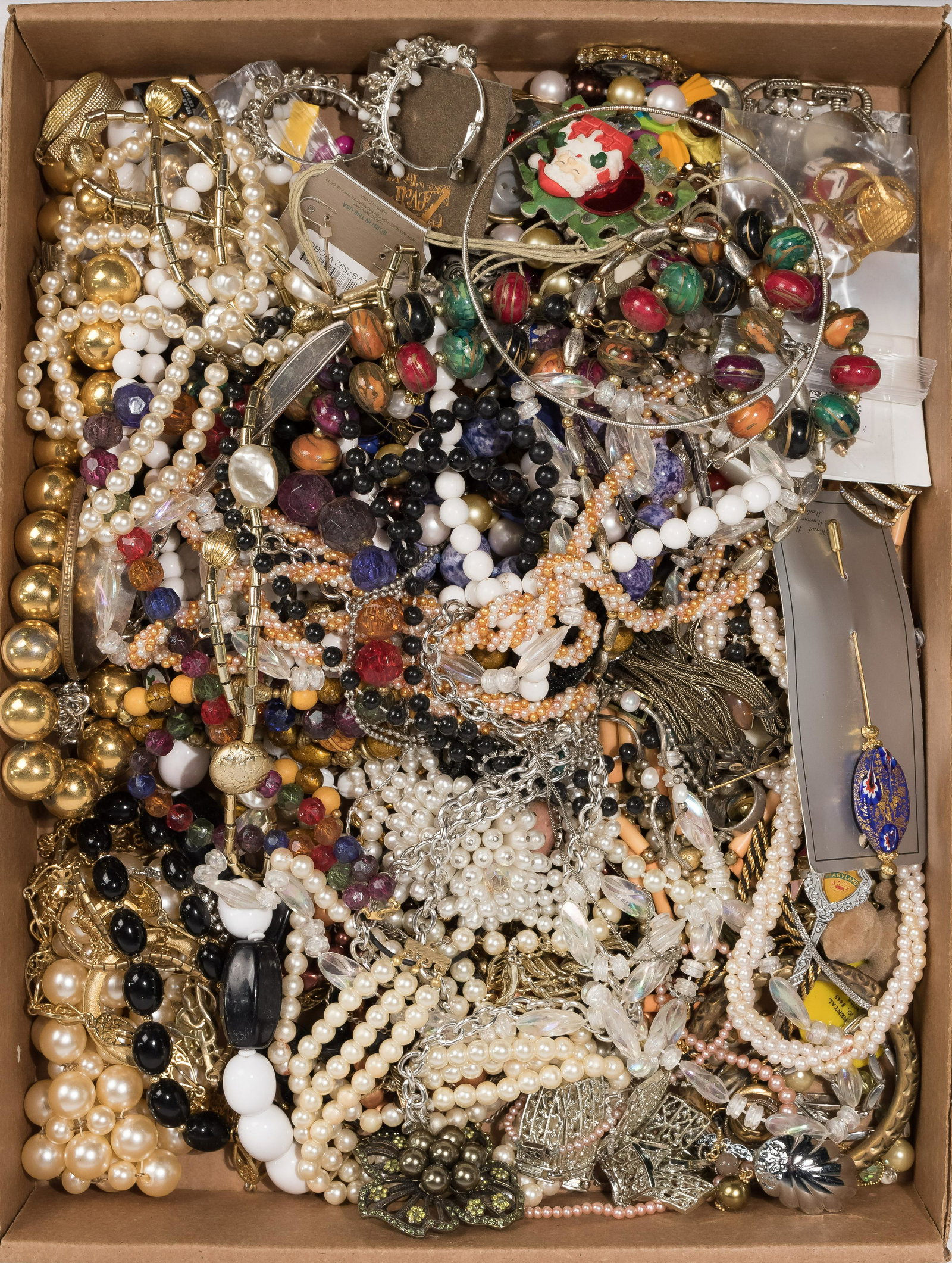 Costume Jewelry Assortment: Approximately (21) pounds of necklaces, earrings, bracelets, pins and rings; including many beaded items Property from: a Joliet, Illinois collector Length: 24 inches (necklace) Condition: Very Good t