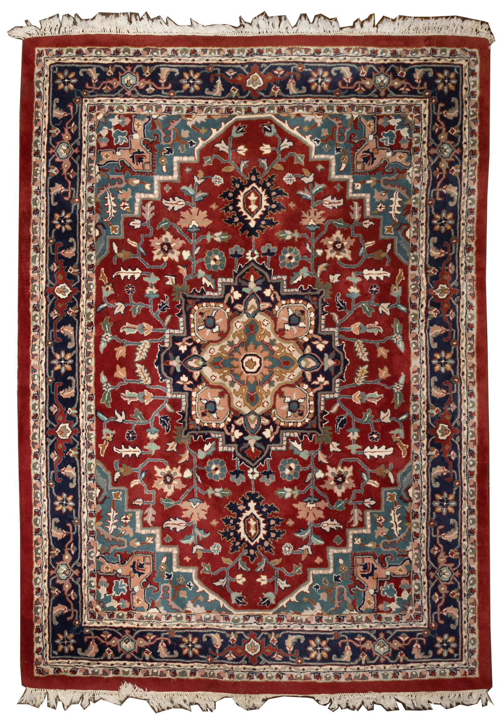Heriz Style Room Size Wool Rug: Heriz Style Room Size Wool Rug Handwoven having a center medallion, an abstract geometric motif in hues of gray, tan, blue and pink on a rust field, fringe; retaining original labels Length: 131 3/4 i