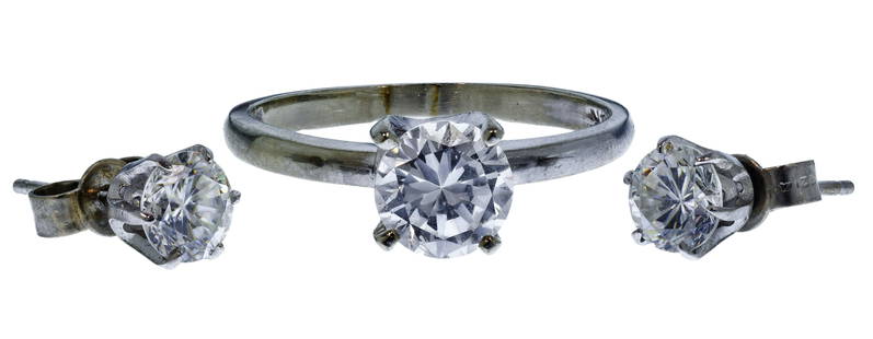 14k White Gold and Cubic Zirconia Ring and Earrings: 14k White Gold and Cubic Zirconia Ring and Earrings (2) items including a solitaire ring marked '14k' inside band and a pair of pierced stud earrings, all having round cut cubic zirconia 