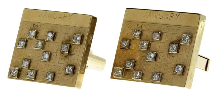 14k Yellow Gold and Diamond Cufflink Set: 14k Yellow Gold and Diamond Cufflink Set January calendar face each having (12) round cut diamonds; marked '14k' on back Property from: a Chicago, Illinois (Gold Coast) estate Height: 7/8