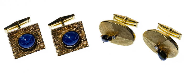 14k Yellow Gold and Sapphire Cufflink Sets: 14k Yellow Gold and Sapphire Cufflink Sets (2) pairs including having an oval cut cabochon blue star sapphire; and having a pear cut grey sapphire adorned by a round cut diamonds; all marked '14k'